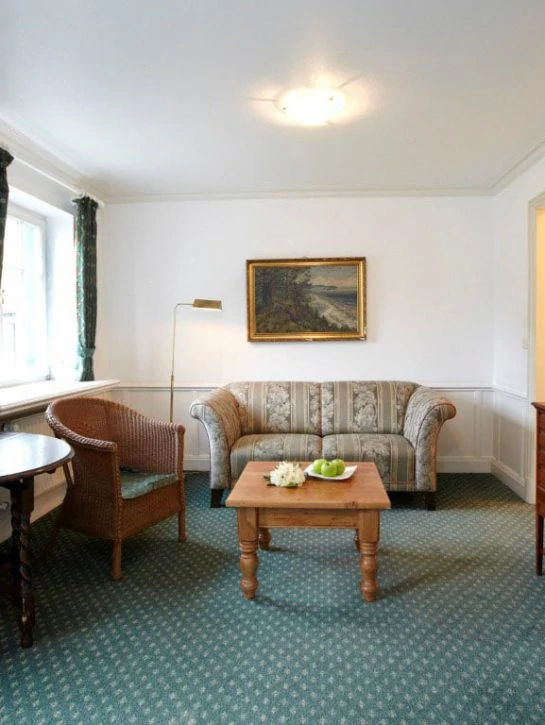 Forsthaus Damerow - Dreibett-Zimmer - Wohnbereich
